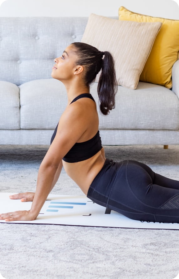 woman in chaturanga yoga pose